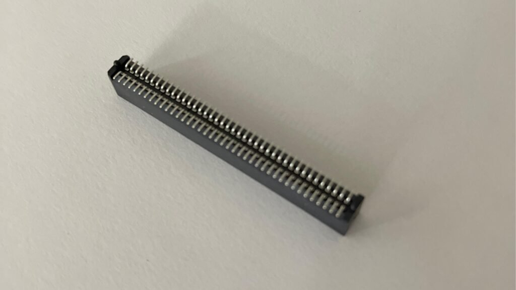 Samtec TFM-140-12-S-D-A surface mount connector with 12-position configuration and gold-plated contacts